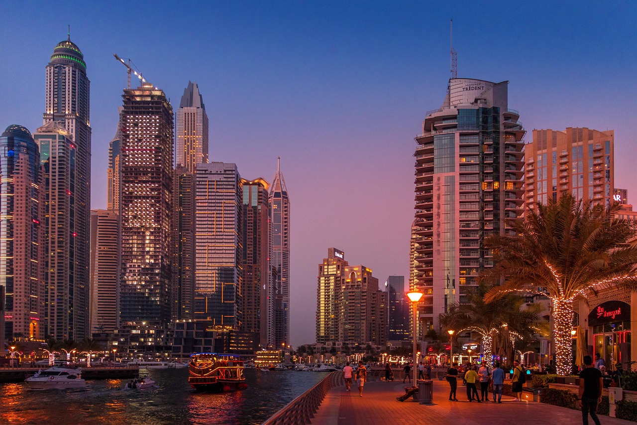 Waterfront towers along Dubai Marina at dusk